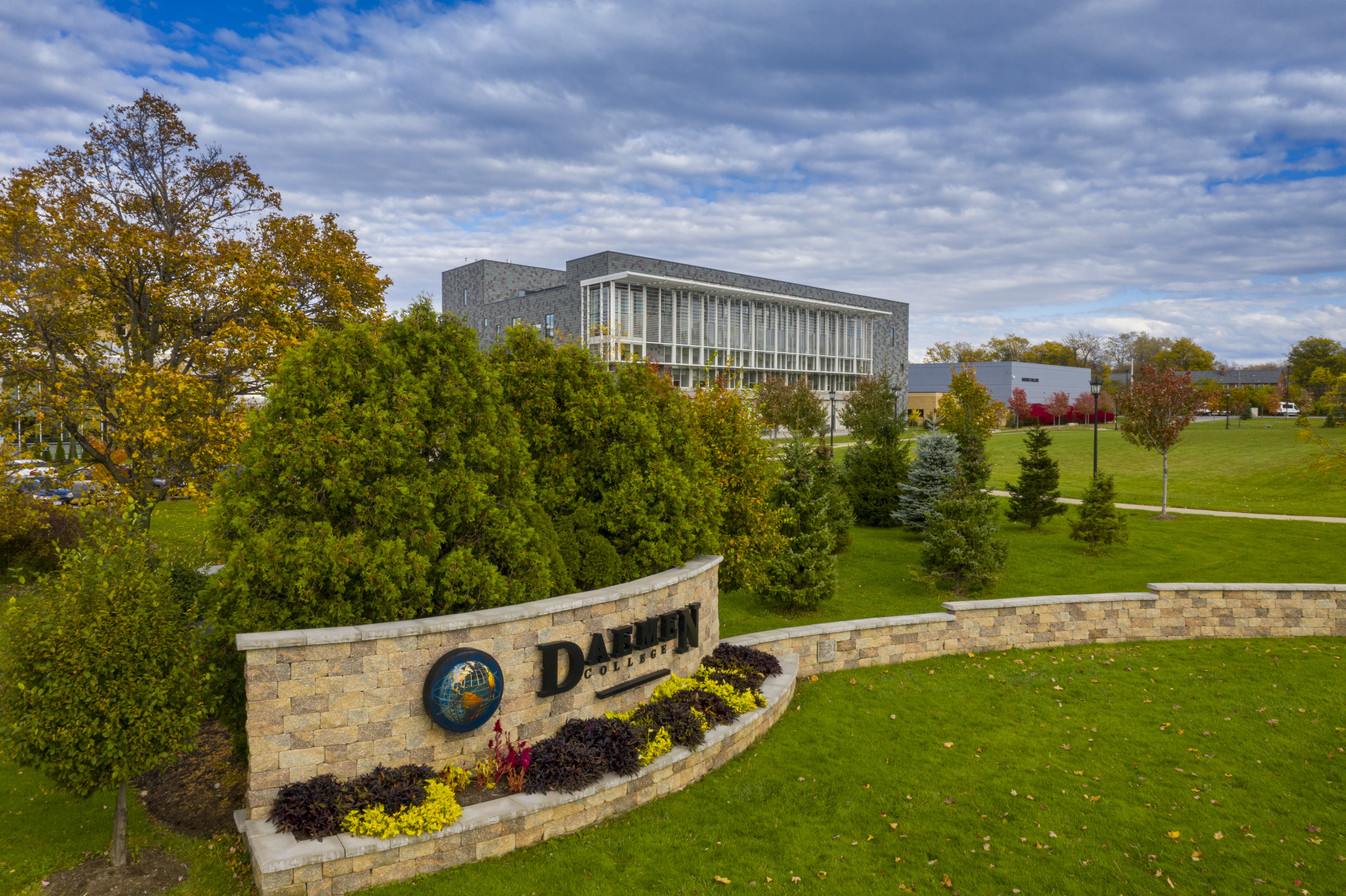 Daemen Front Sign in Fall