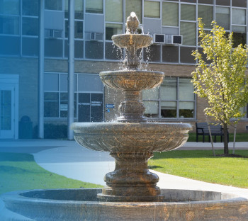 Promotional image for the Virtual Graduate Information Sessions showing the fountain inside Saffrin Public Square.